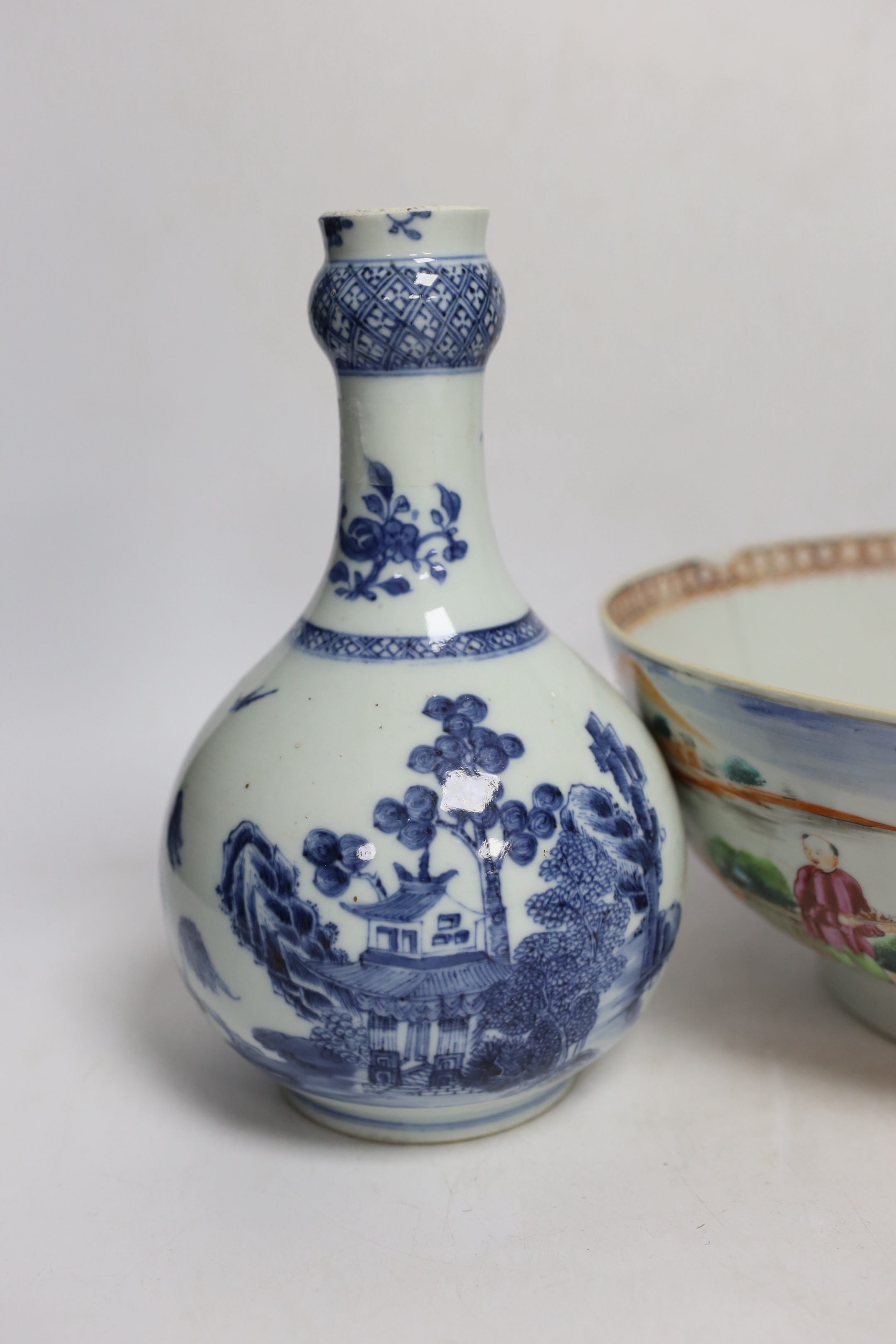 A Chinese Qianlong blue and white garlic neck vase and a famille rose bowl, 18th century largest 26cm in diameter